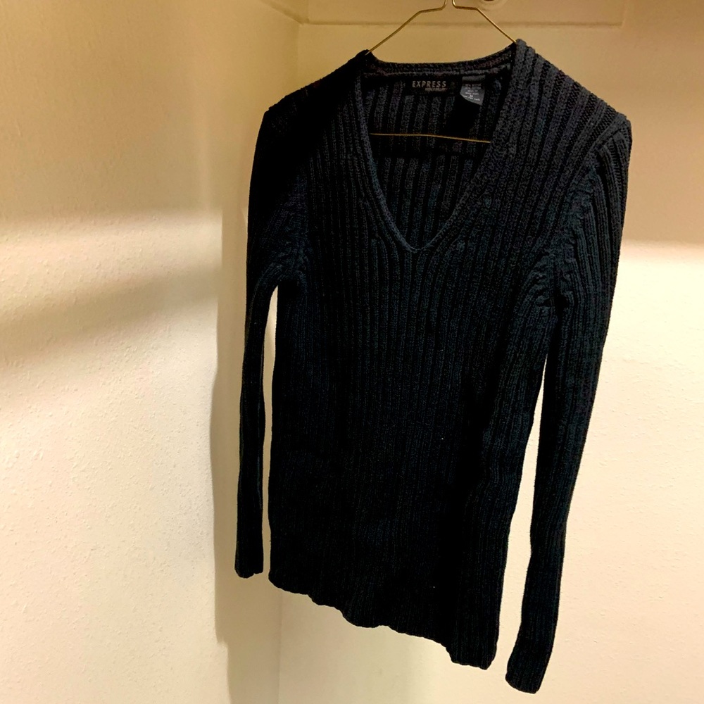 Black v-neck sweater.